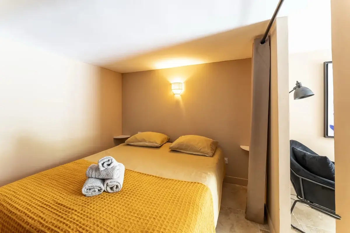 Separate bedroom with a double bed