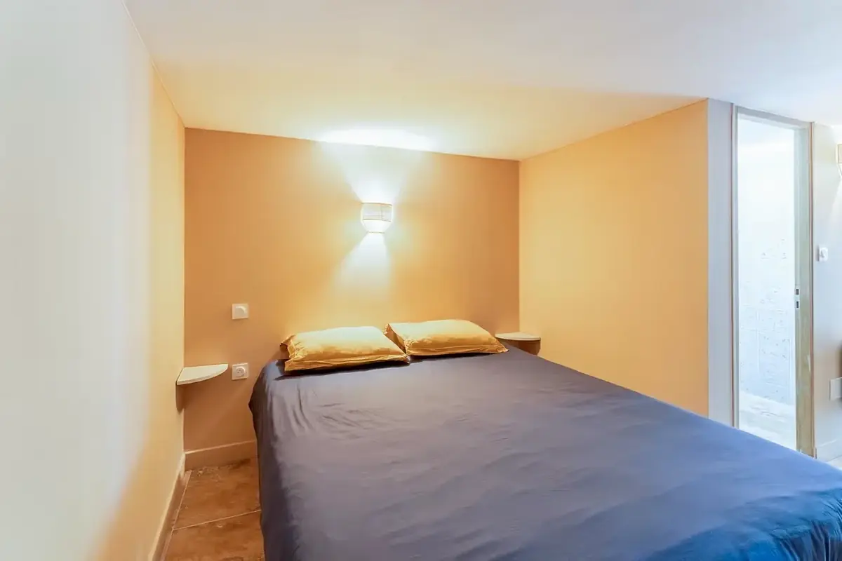 First bedroom with a double bed